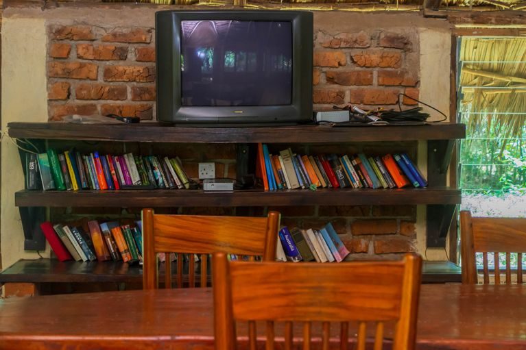 Bookshelves and seating in the club room