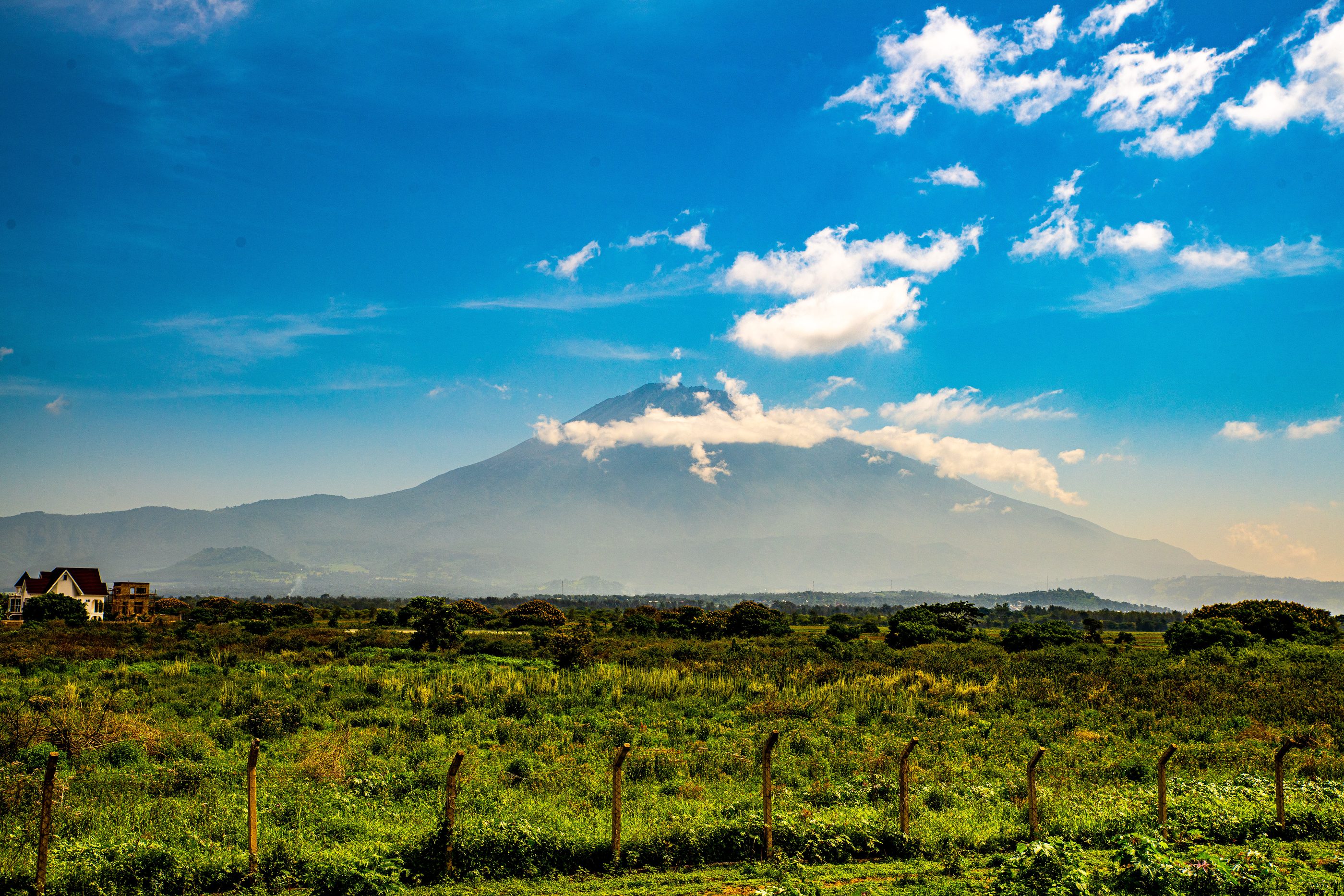 Mount Meru under a wide blue sky